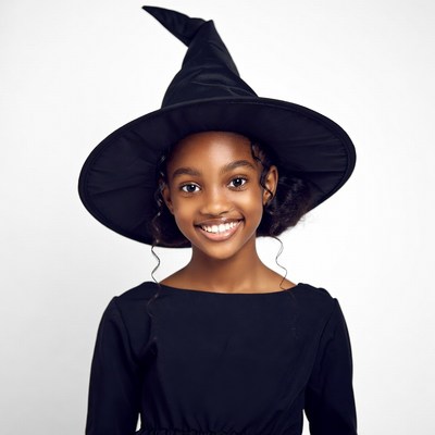 African-American girl in witch hat