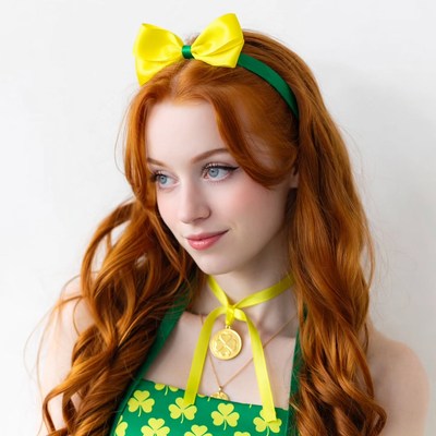 Redhead woman in green shamrock dress