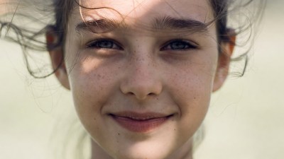 Smiling girl with flowing hair