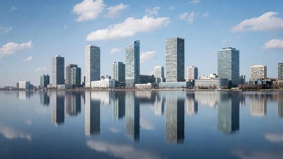Skyscrapers reflecting in calm lake