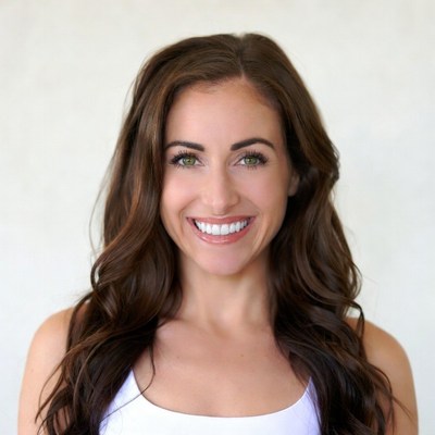 Smiling woman with long brown hair