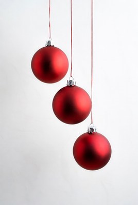 Three Red Christmas Baubles Hanging