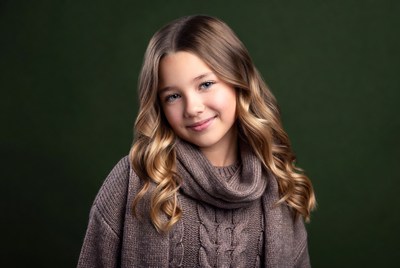 Smiling girl in sweater