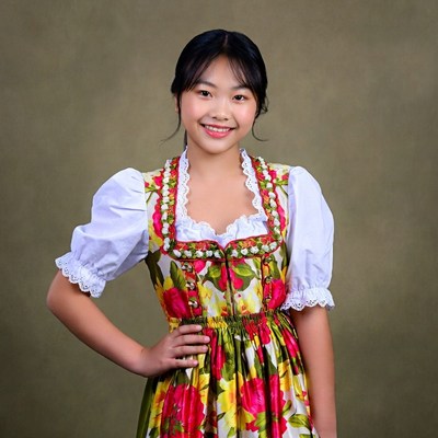 Asian girl in traditional dirndl dress