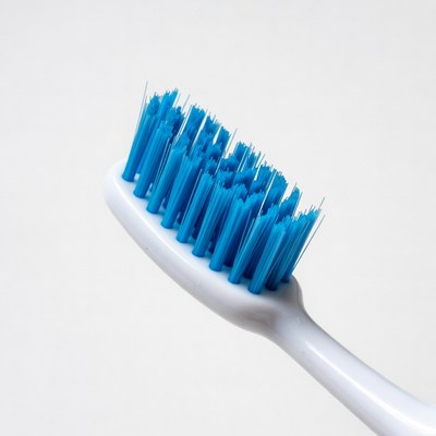 Blue toothbrush on white background