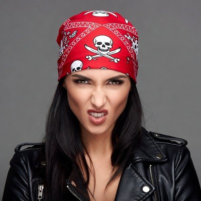 Woman in red skull bandana sticking tongue out