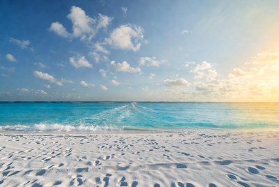 Sandy Beach at Sunset with Turquoise Ocean