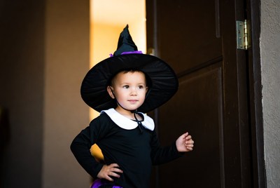 Toddler girl in witch costume