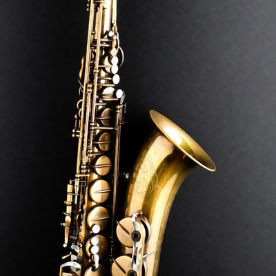 Brass Saxophone on Black Background