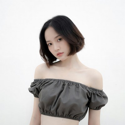 Asian woman in off-shoulder top