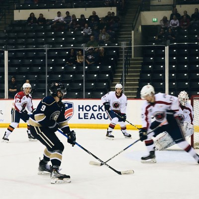 Hockey players action on ice rink