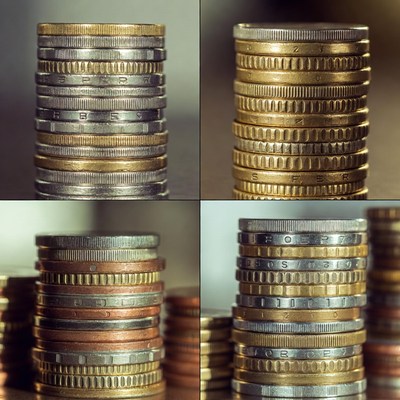 Stacked Coins in Silver Gold Copper