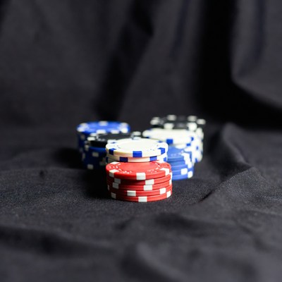 Colorful Poker Chips on Black Background