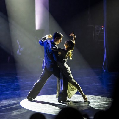 Couple Dancing Tango on Stage