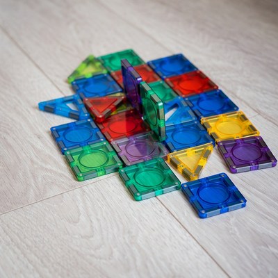 Colorful Magnatiles Scattered on Floor