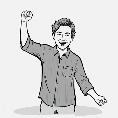 Asian man raising fists in victory