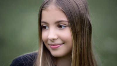 Smiling girl with long brown hair