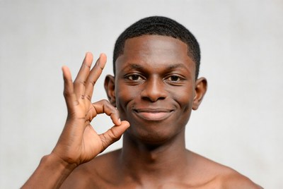African-American man making OK sign