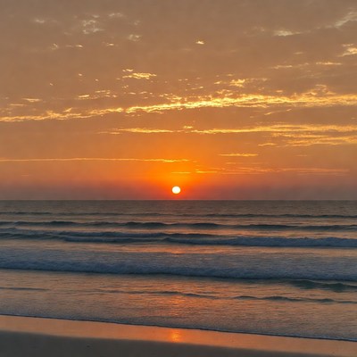 Sunset over ocean beach