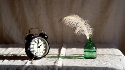 Vintage Alarm Clock with Feather Quill