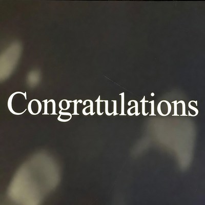 Congratulations Text on Dark Background