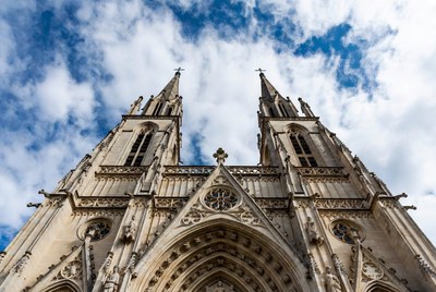 Gothic Cathedral Towers Against Blue Sky