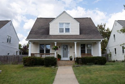 White Suburban House with Porch