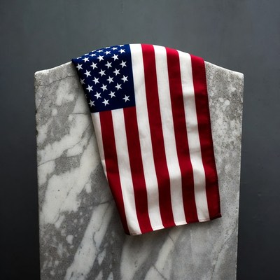 American Flag Draped on Tombstone