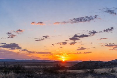 Sunset over desert landscape