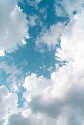 Fluffy Clouds in Blue Sky