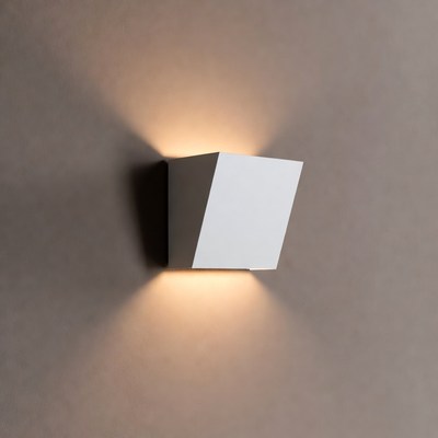White angular wall light glowing