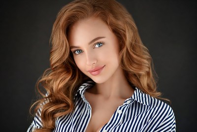 Beautiful redhead woman smiling