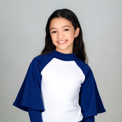 Asian girl smiling in blue raglan shirt