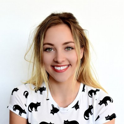 Smiling woman in black cat t-shirt