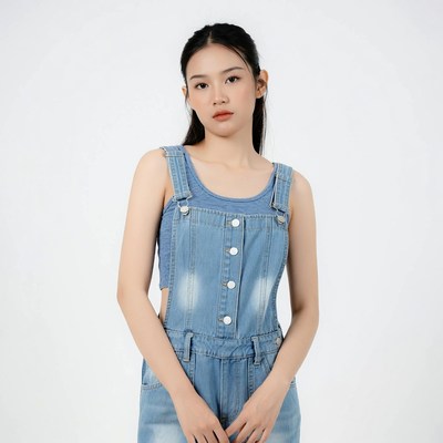 Asian woman in blue denim overalls