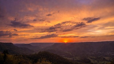 Sunset over Autumn Valley Cliffs