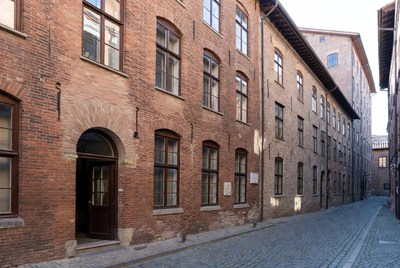 Historic Brick Buildings on Cobblestone Alley
