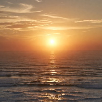 Sunset over ocean waves