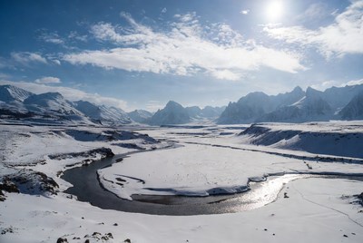 Snowy Mountain Valley with Winding River