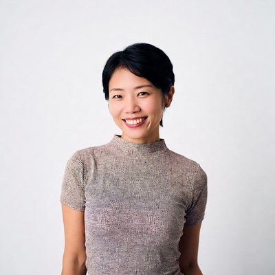 Smiling Asian woman with short black hair