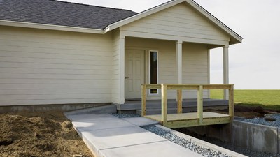 Beige House with Wooden Deck