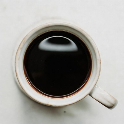 Black coffee in white cup