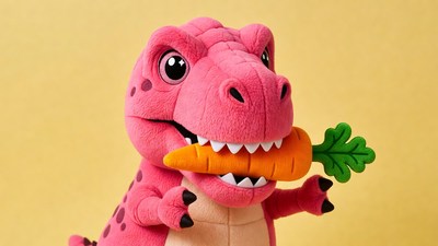 Pink T-Rex Plush Holding Carrot