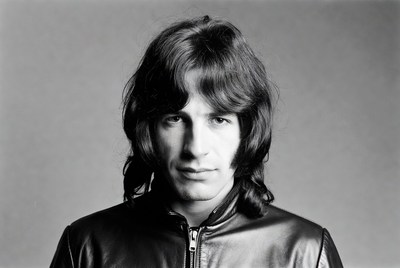 Man with long hair in leather jacket