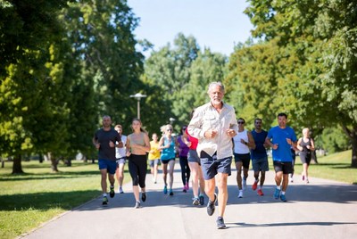 Group of runners jogging in park