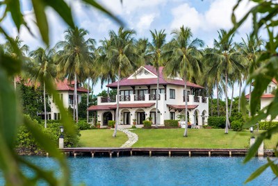 Luxury White Villa by Lake with Palm Trees
