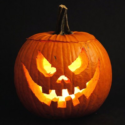 Jack-o'-lantern pumpkin on black background