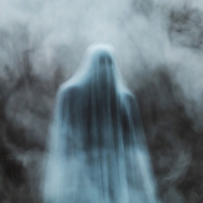 Ghostly Figure in Foggy Mist