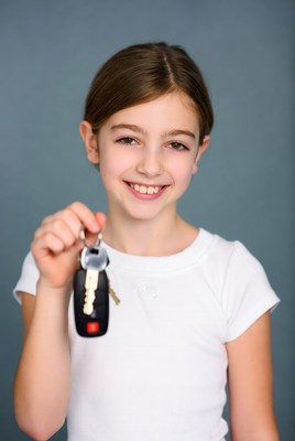 Girl holding car keys