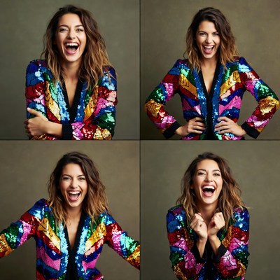 Woman laughing in colorful sequin jacket